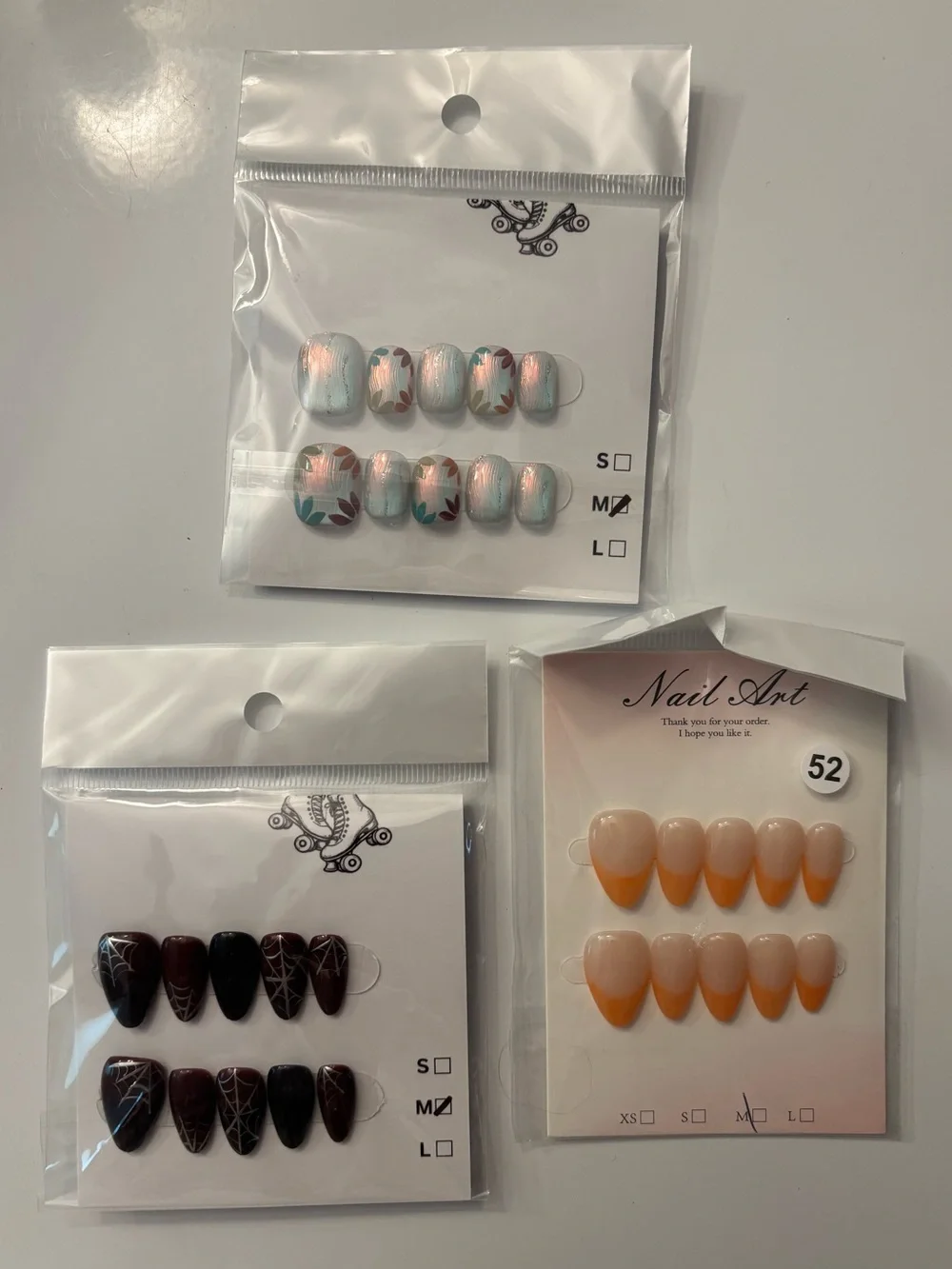 Assorted Press-On Nail Sets — Pastel Floral, Burgundy Spiderweb, Orange Gradient